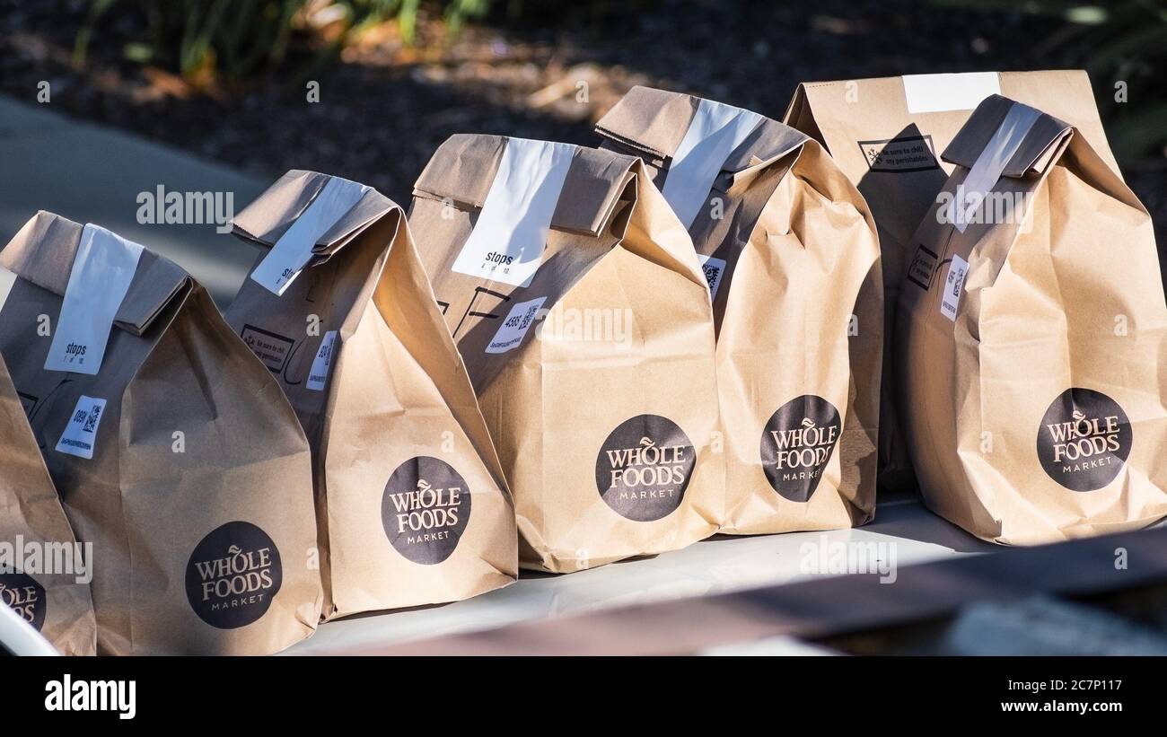 July 12, 2020 Sunnyvale / CA / USA - Brown bags with fresh groceries ordered online through Amazon Prime from Whole Foods Market and home delivered du Stock Photo