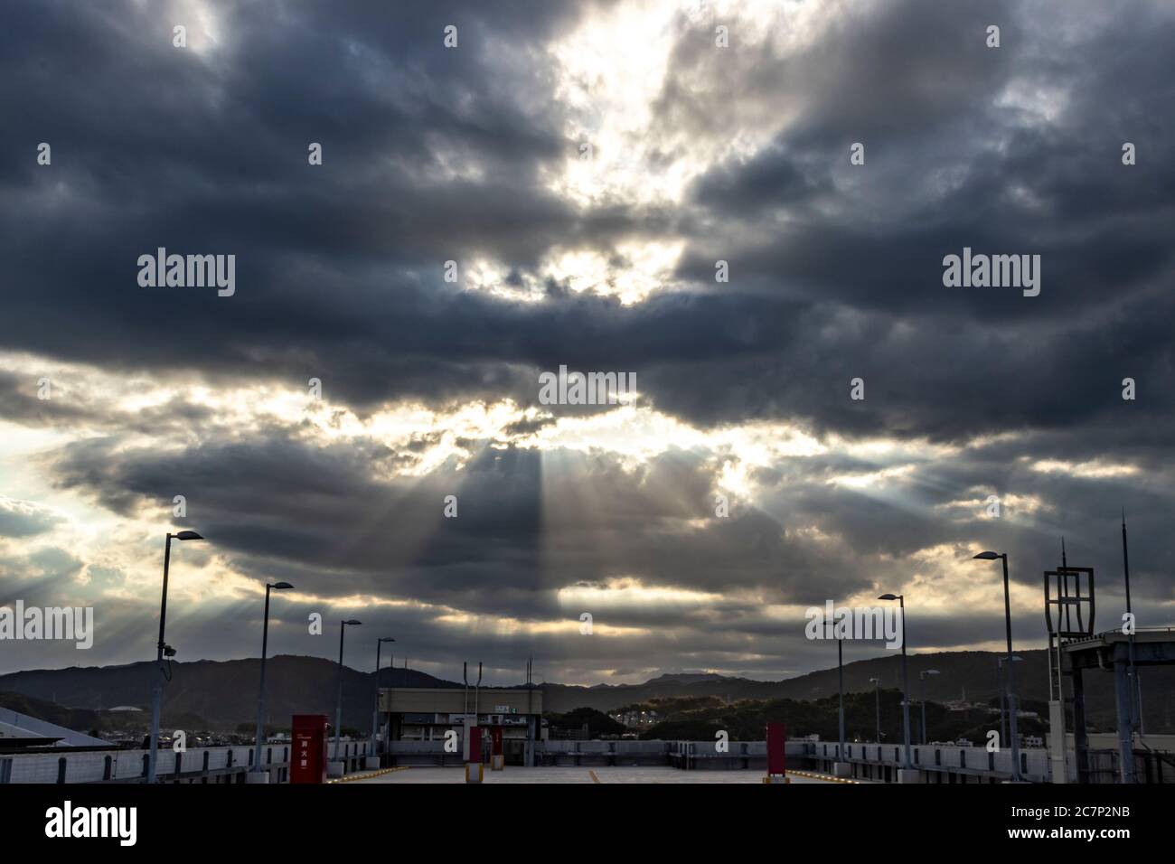 Sunlight Breaking the Clouds Stock Photo