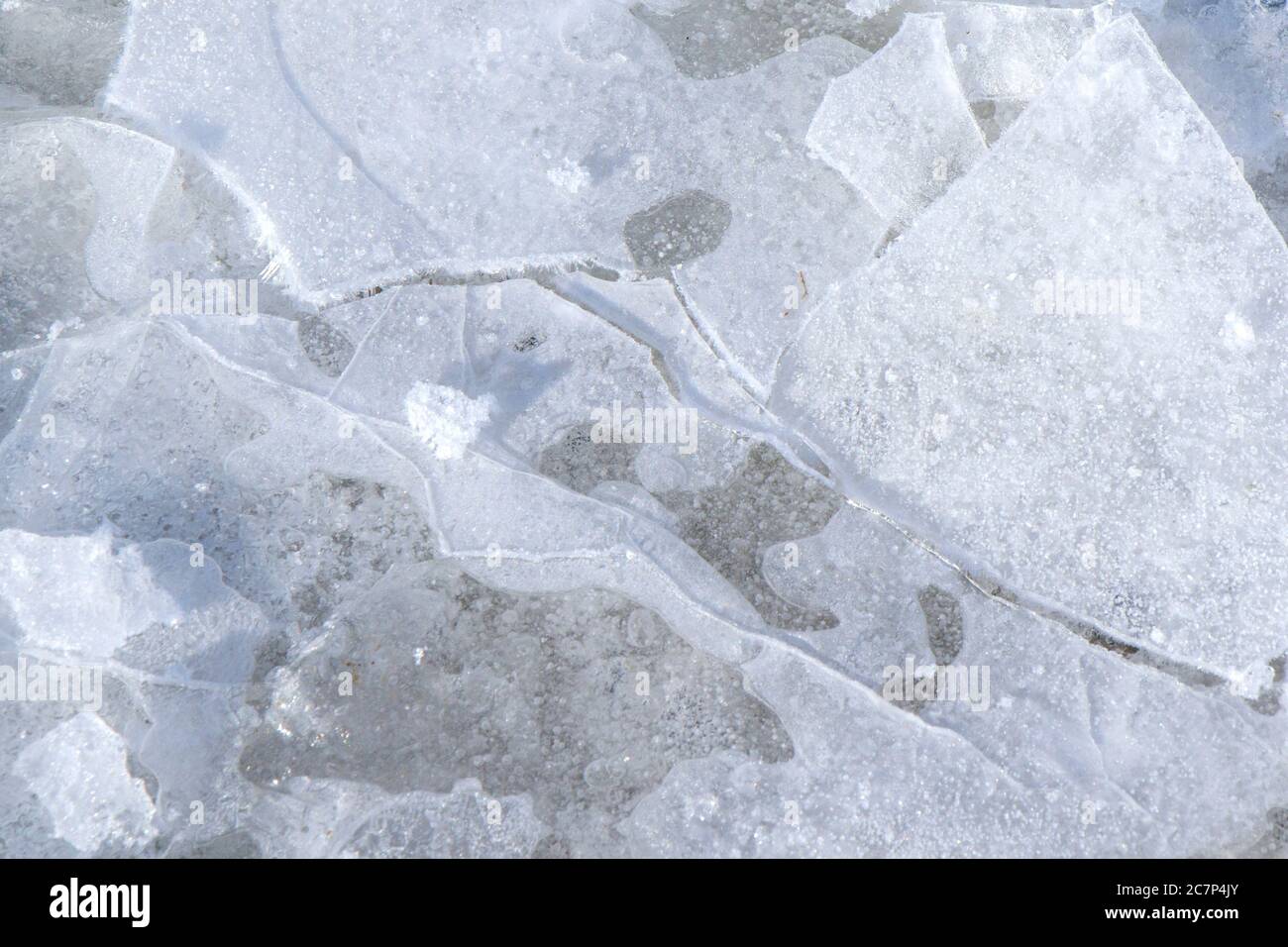 Ice texture, background and pattern. Frozen water. Broken ice. White ...
