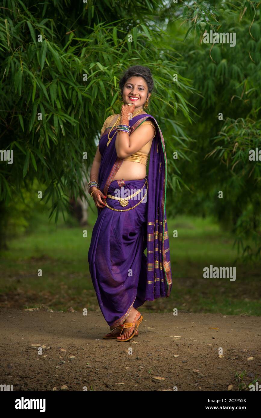 Beautiful Indian Young Girl In Traditional Saree Posing Outdoors Stock  Photo, Picture and Royalty Free Image. Image 147639161.