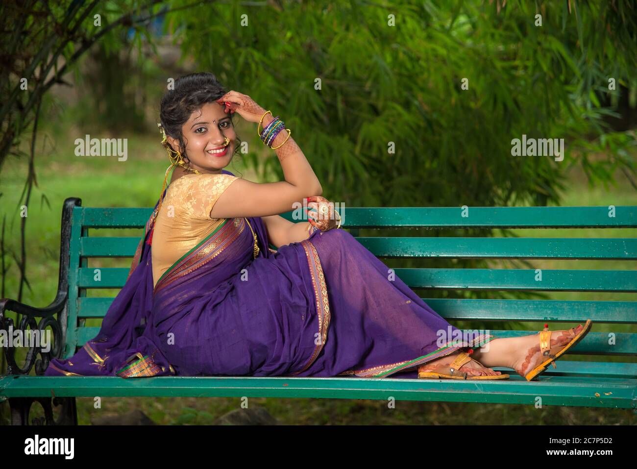 Beautiful Indian young girl in Traditional Saree posing outdoors 4976611  Stock Photo at Vecteezy