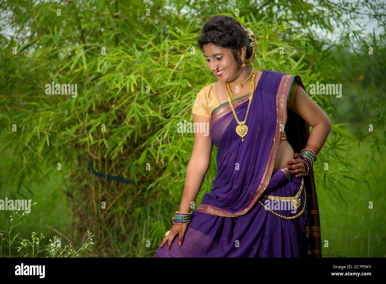 Indian Traditional Beautiful young girl in saree posing outdoors Stock ...