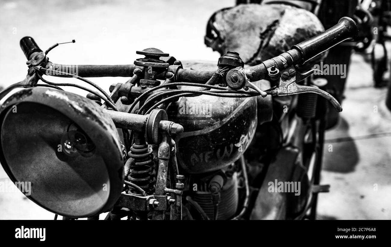 Grayscale closeup of a vintage motorcycle Stock Photo