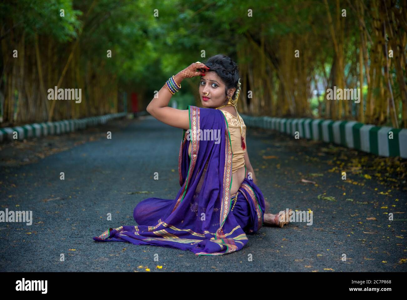 Stylish Indian woman in silk saree and nose ring with OK gesture in a front  pose, Stock Photo, Picture And Rights Managed Image. Pic. ZQ5-3057534 |  agefotostock