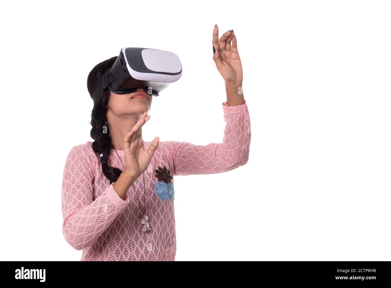 Indian young girl looking though VR device, 3D Virtual Reality Glasses