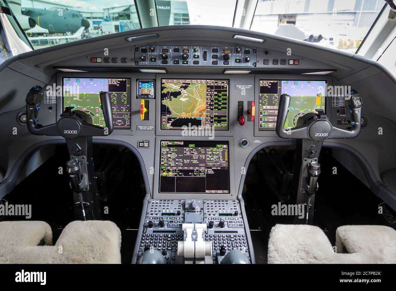 PARIS, FRANCE - JUN 21, 2019: Modern glass cockpit of the Dassault Falcon 2000S business jet at the Paris Air Show. Stock Photo
