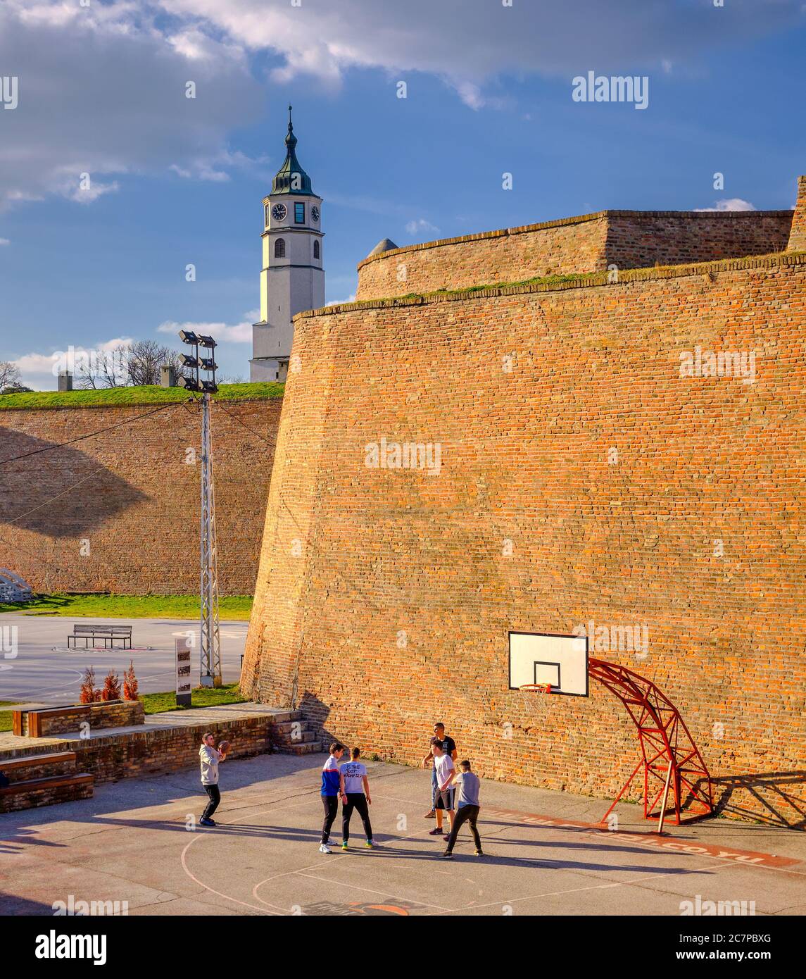 Belgrade / Serbia - February 22, 2020: Teenagers playing basketball at basketball court in Belgrade fortress (Kalemegdan park) Stock Photo
