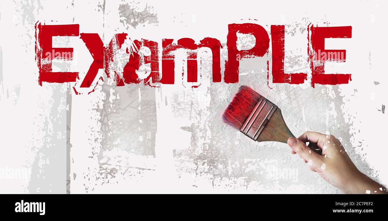 Example written with red paintbrush on a wall. Conceptual image Stock Photo