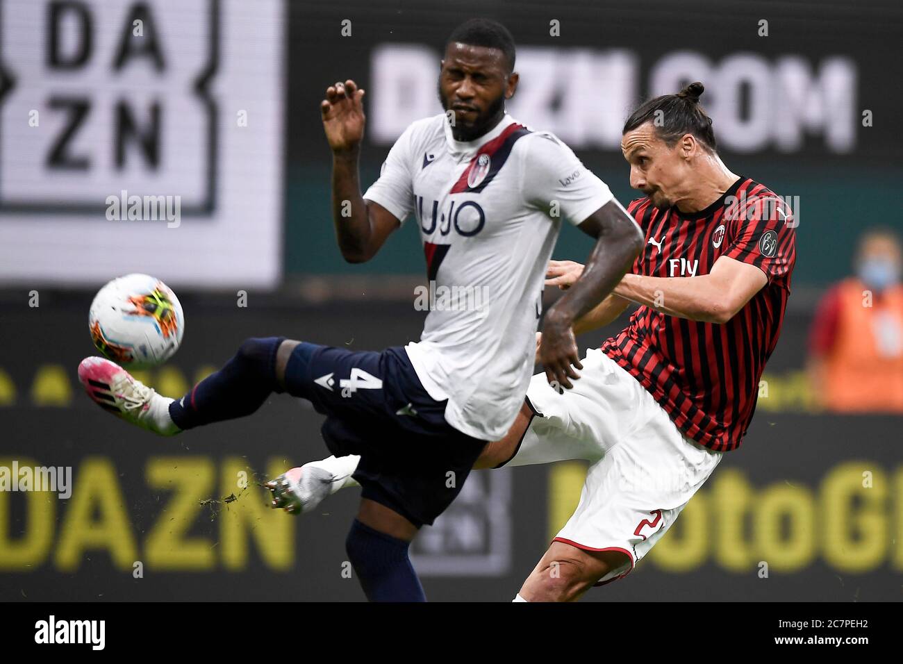 Milan, Italy. 18th July, 2020. MILAN, ITALY - July 18, 2020: Zlatan Ibrahimovic of AC Milan and Stefano Denswil of Bologna FC in action during the Serie A football match between AC Milan and Bologna FC. AC Milan won 5-1 over Bologna FC. (Photo by Nicolò Campo/Sipa USA) Credit: Sipa USA/Alamy Live News Stock Photo