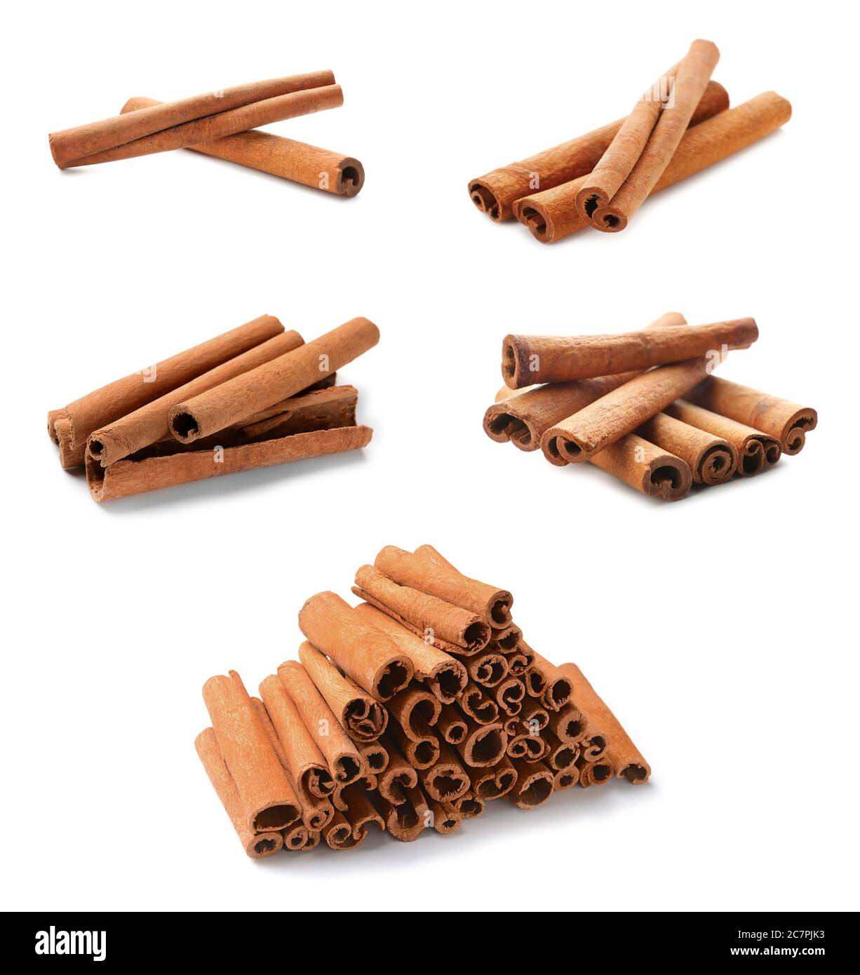 Aromatic cinnamon sticks on white background Stock Photo
