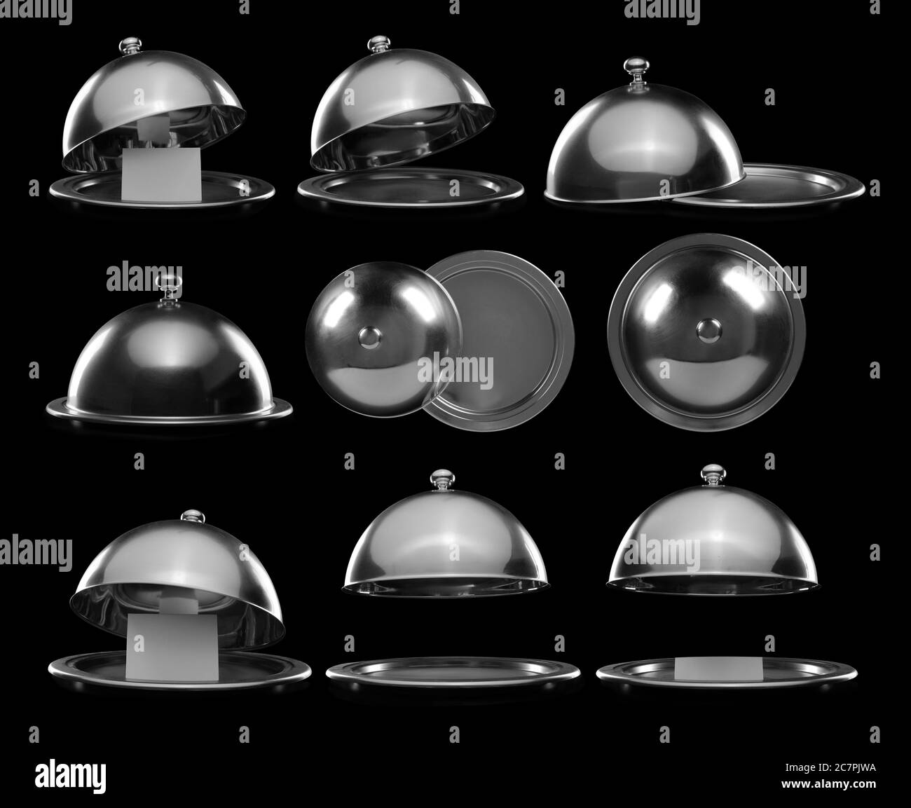 Trays with cloches on dark background Stock Photo
