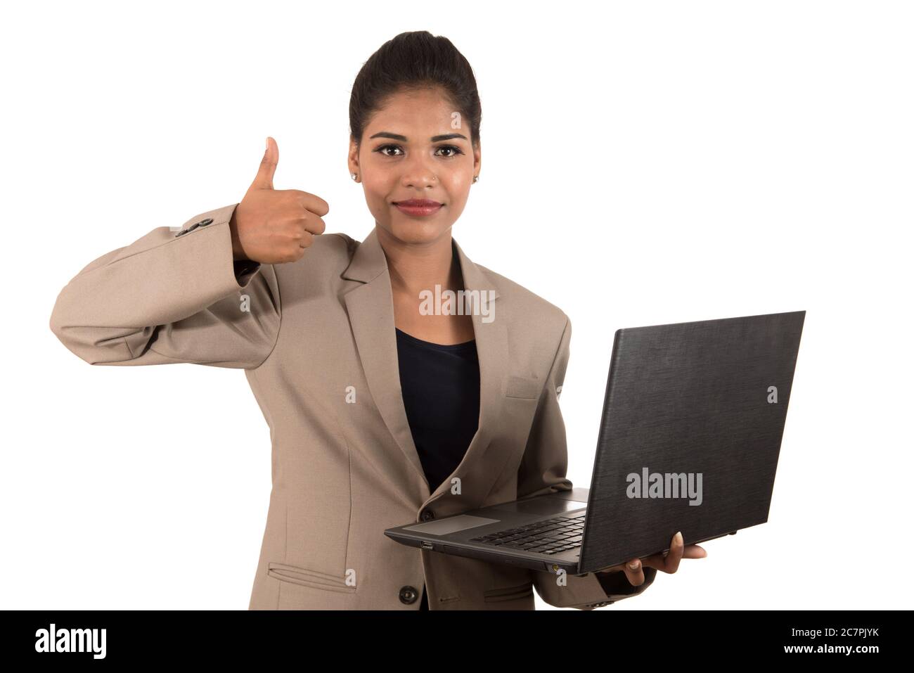 Happy excited business woman holding laptop and showing thumbs up ...