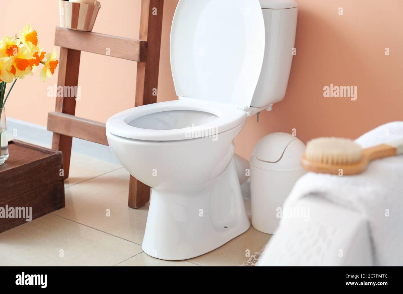 Modern toilet bowl in interior of bathroom Stock Photo - Alamy