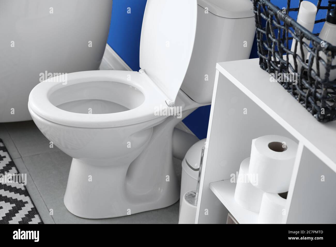 Modern toilet bowl in interior of bathroom Stock Photo - Alamy