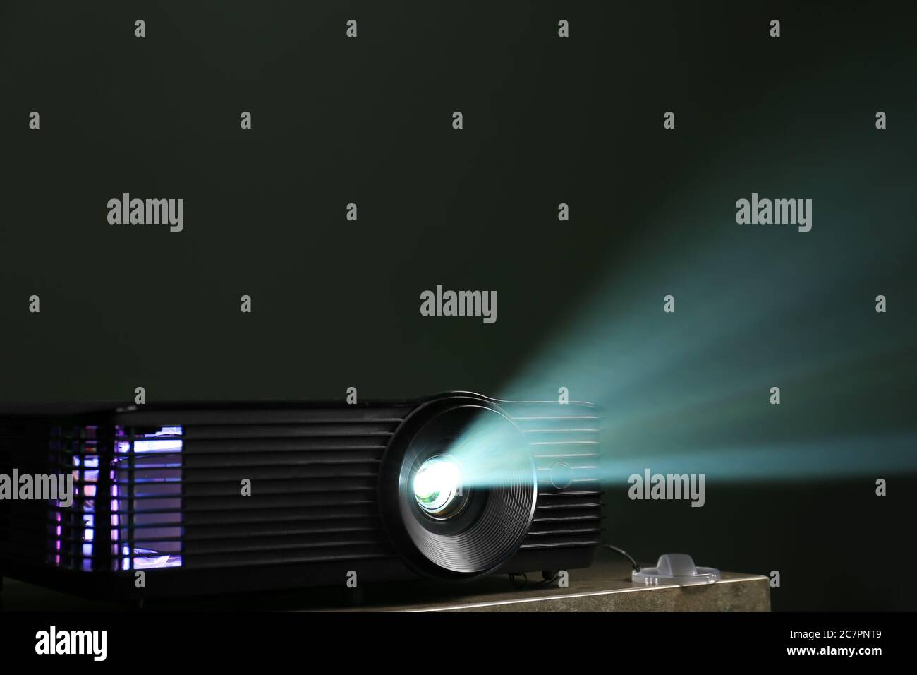Projector Background Video Modern video projector on dark background Stock Photo - Alamy