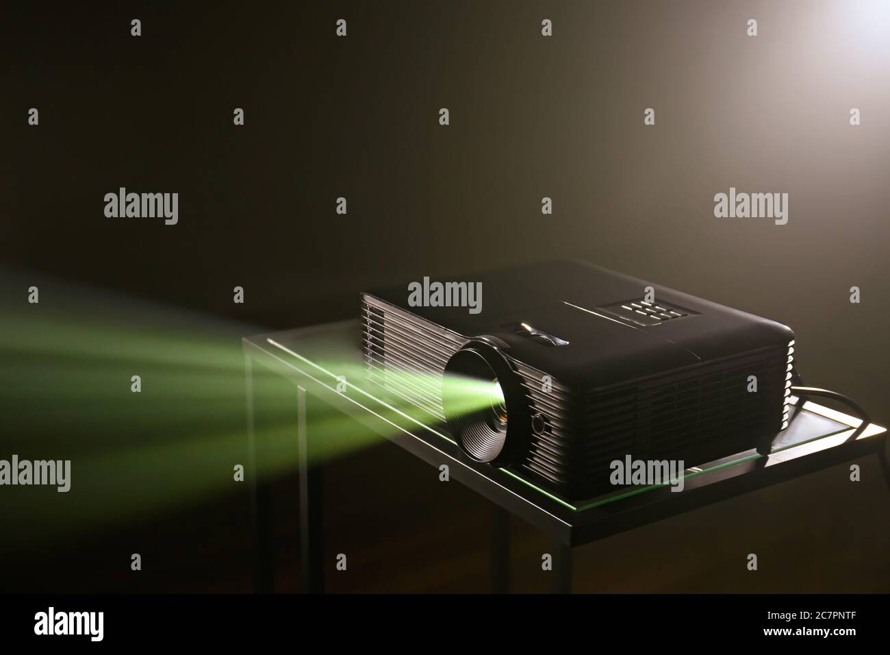 Projector Background Video Modern video projector on dark background Stock Photo - Alamy