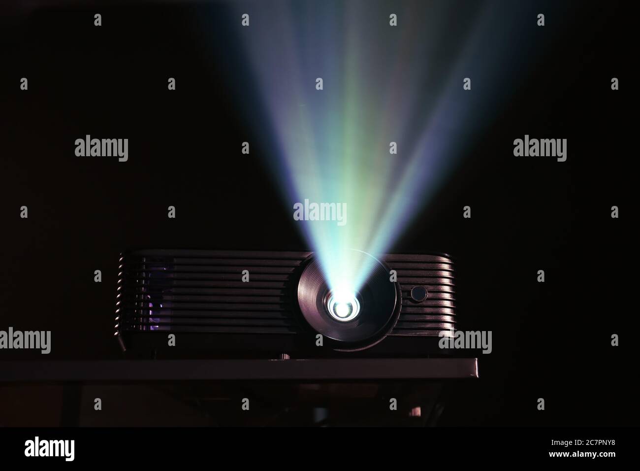 Projector Background Video Modern video projector on dark background Stock Photo - Alamy