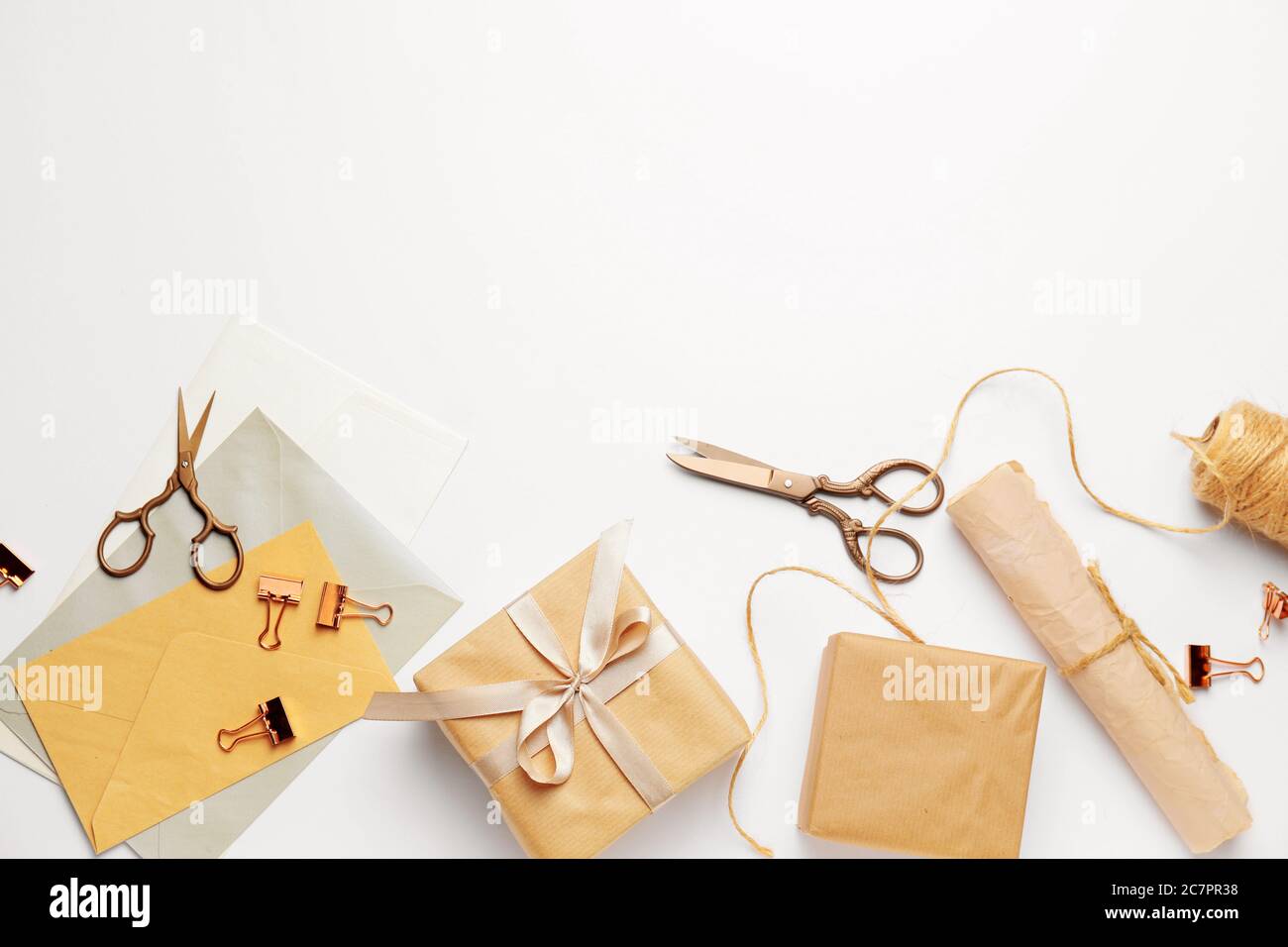 Gift boxes with supplies on white background Stock Photo