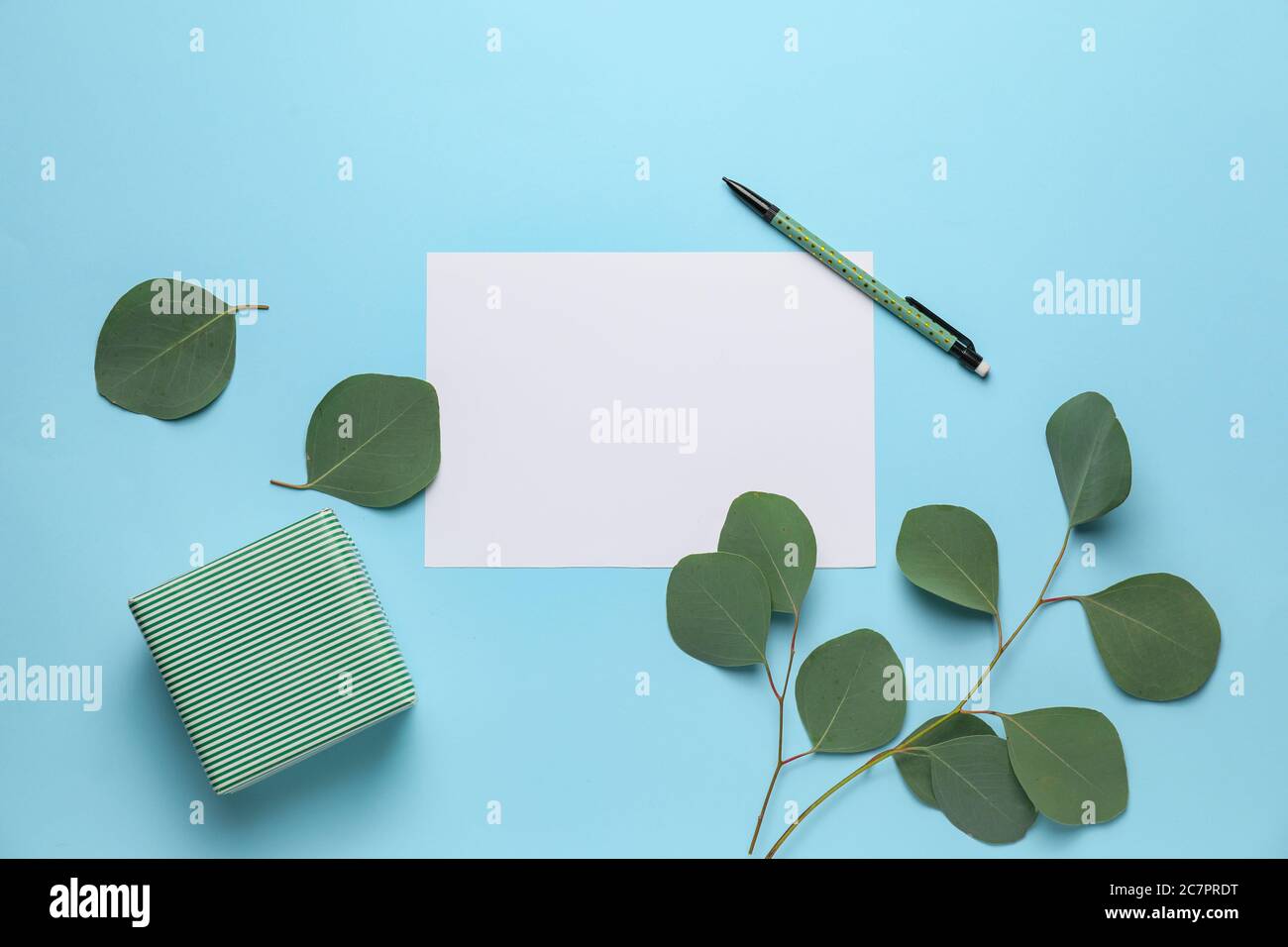 Composition with blank card on color background Stock Photo