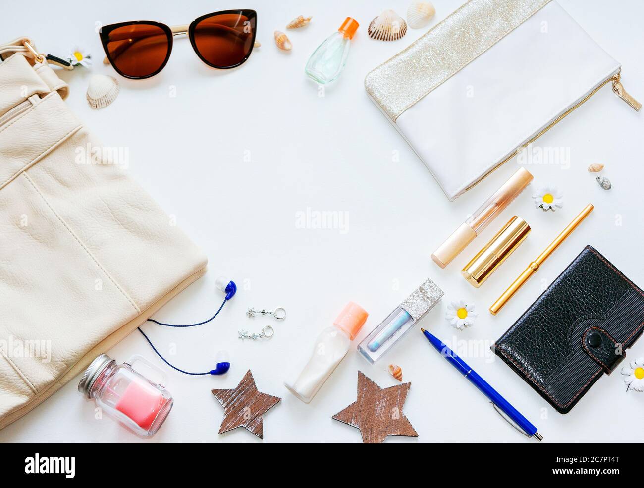 Outfit of young woman or modern teenager girl on white background - cosmetic and lifestyle accessories. Flat lay objects. Stock Photo