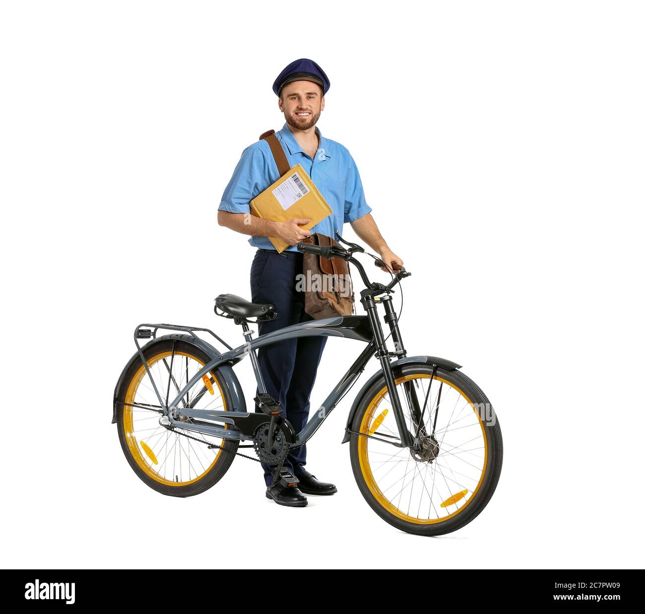 Handsome young postman with bicycle on white background Stock Photo