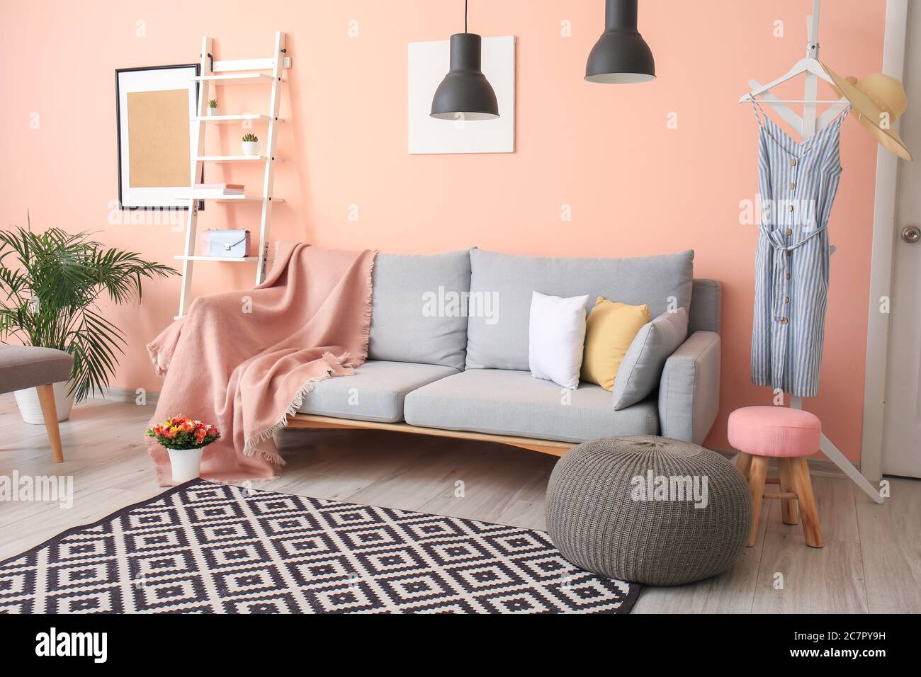 Stylish interior of modern living room with sofa Stock Photo - Alamy