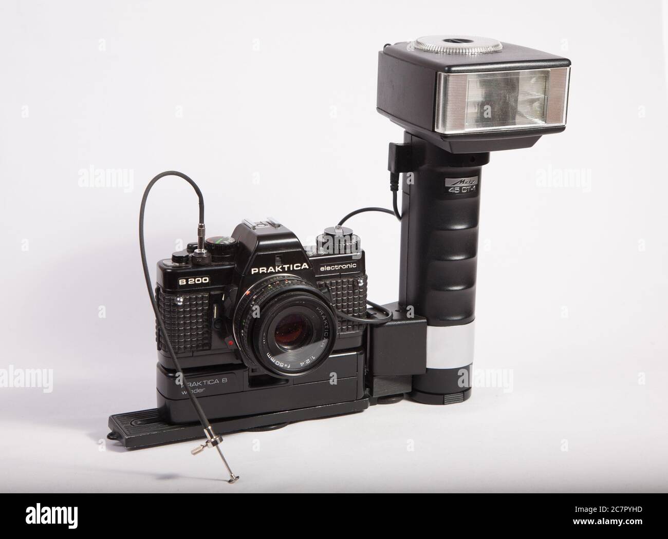 Vintage camera with flash and shutter-release cable. Stock Photo