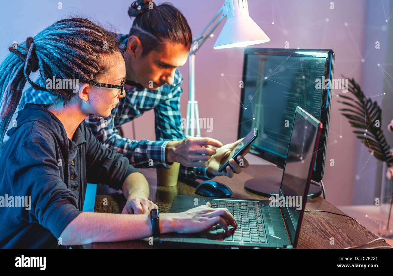 Programmers are developing software by working with software code ...