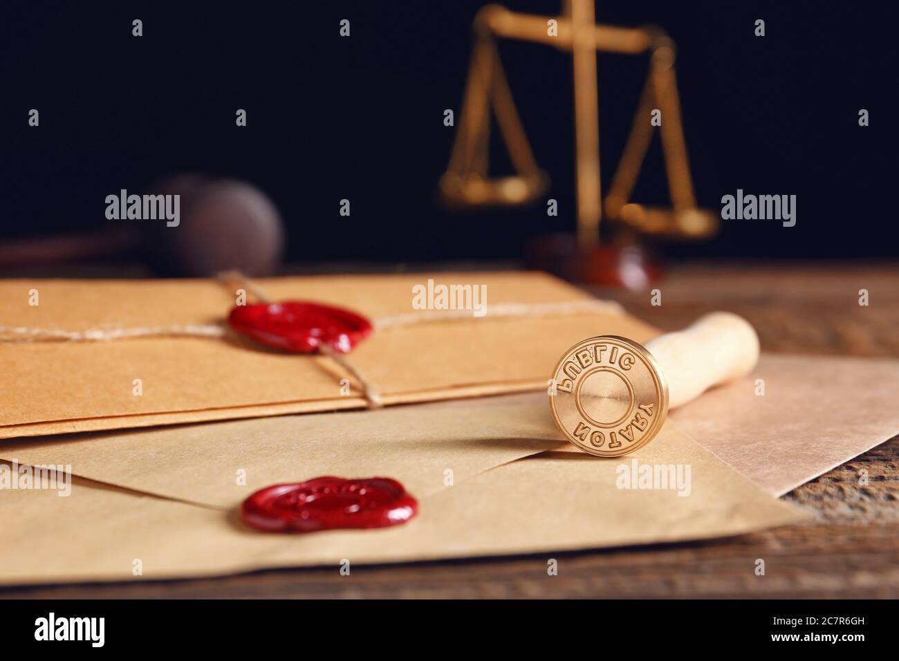 Envelopes with notary public wax seals on table, closeup Stock Photo