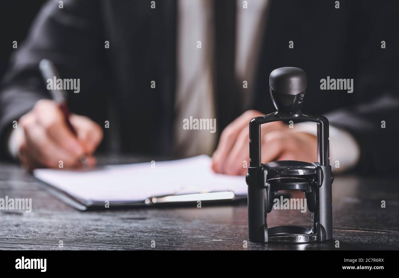 Stamp at workplace of notary public Stock Photo - Alamy