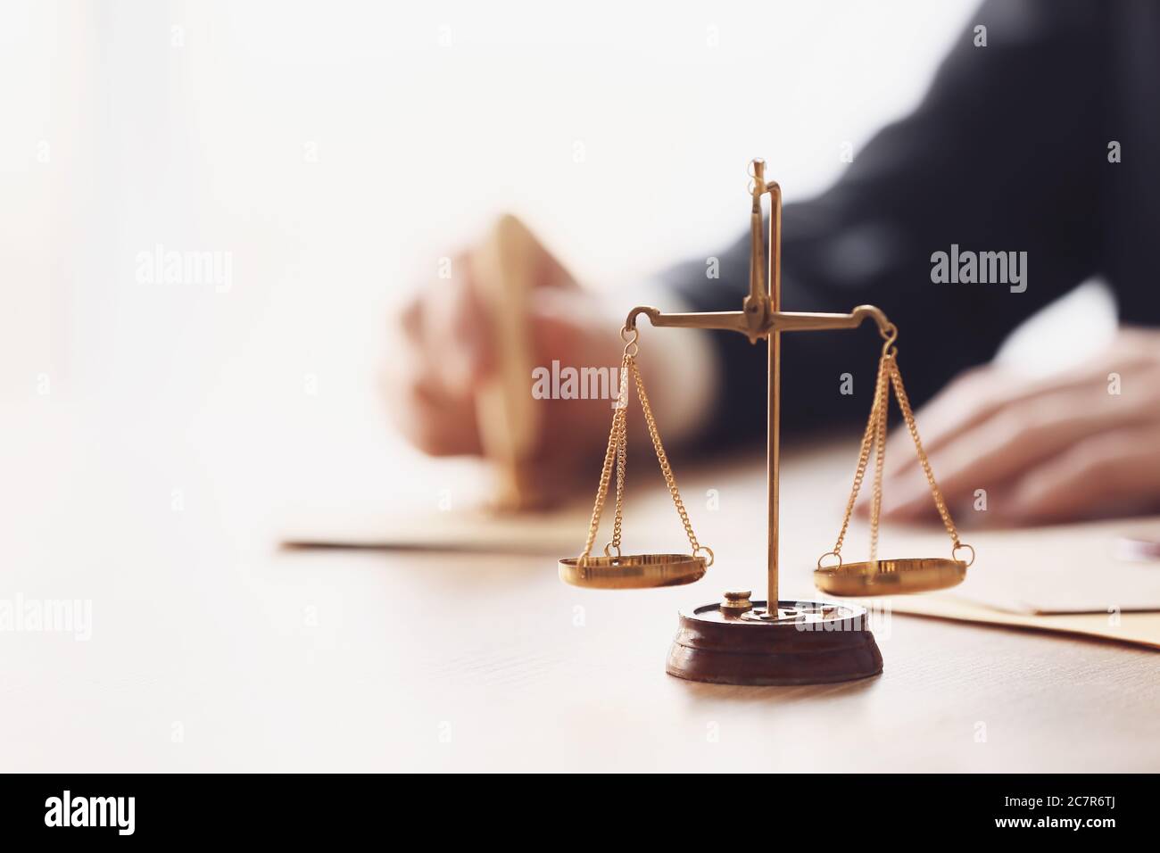 Scales of justice at workplace of notary public Stock Photo - Alamy