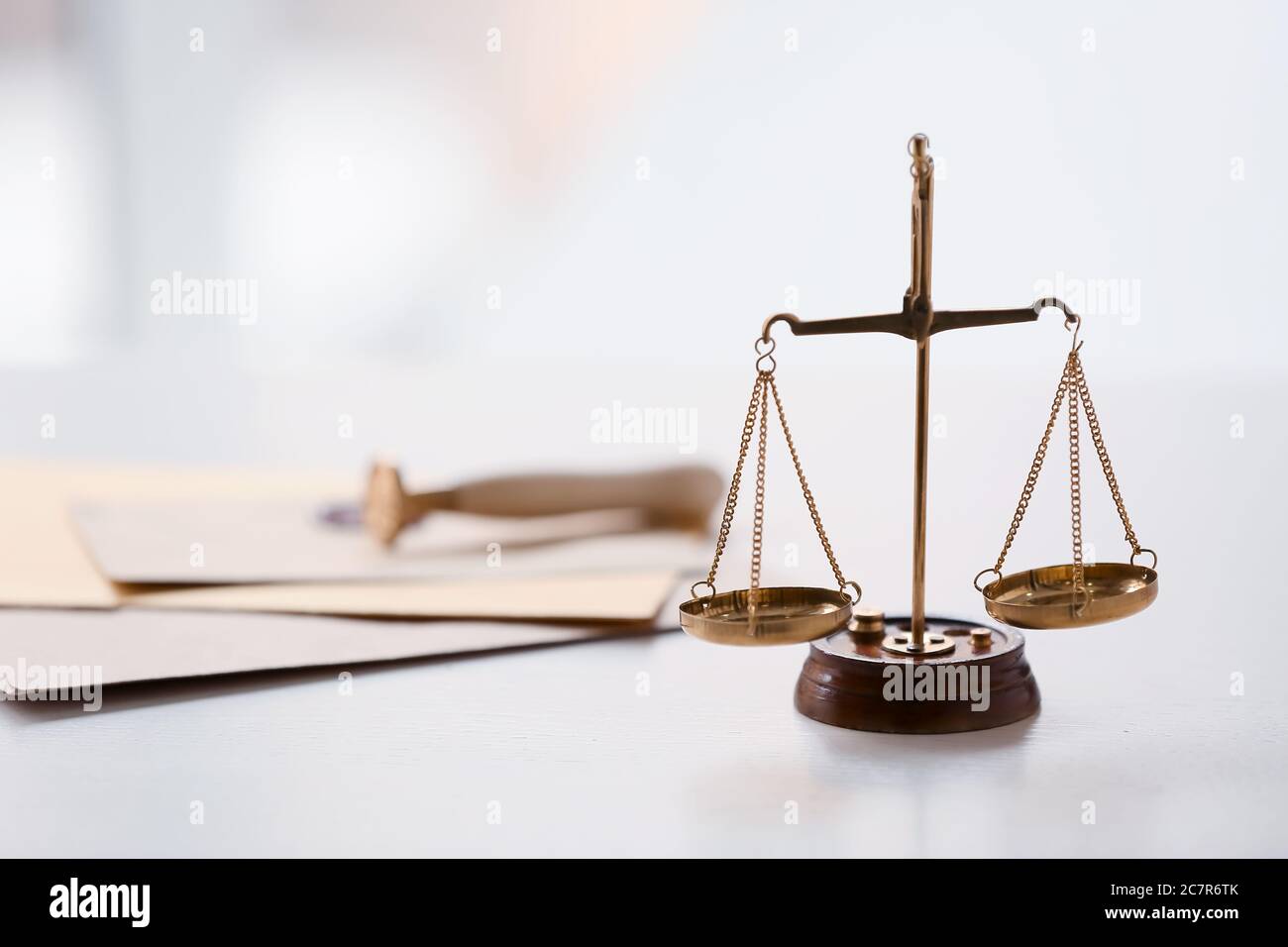 Scales of justice at workplace of notary public Stock Photo - Alamy