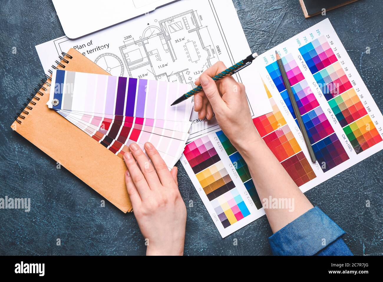 Working With Color Designer working with color palettes, top view Stock Photo - Alamy