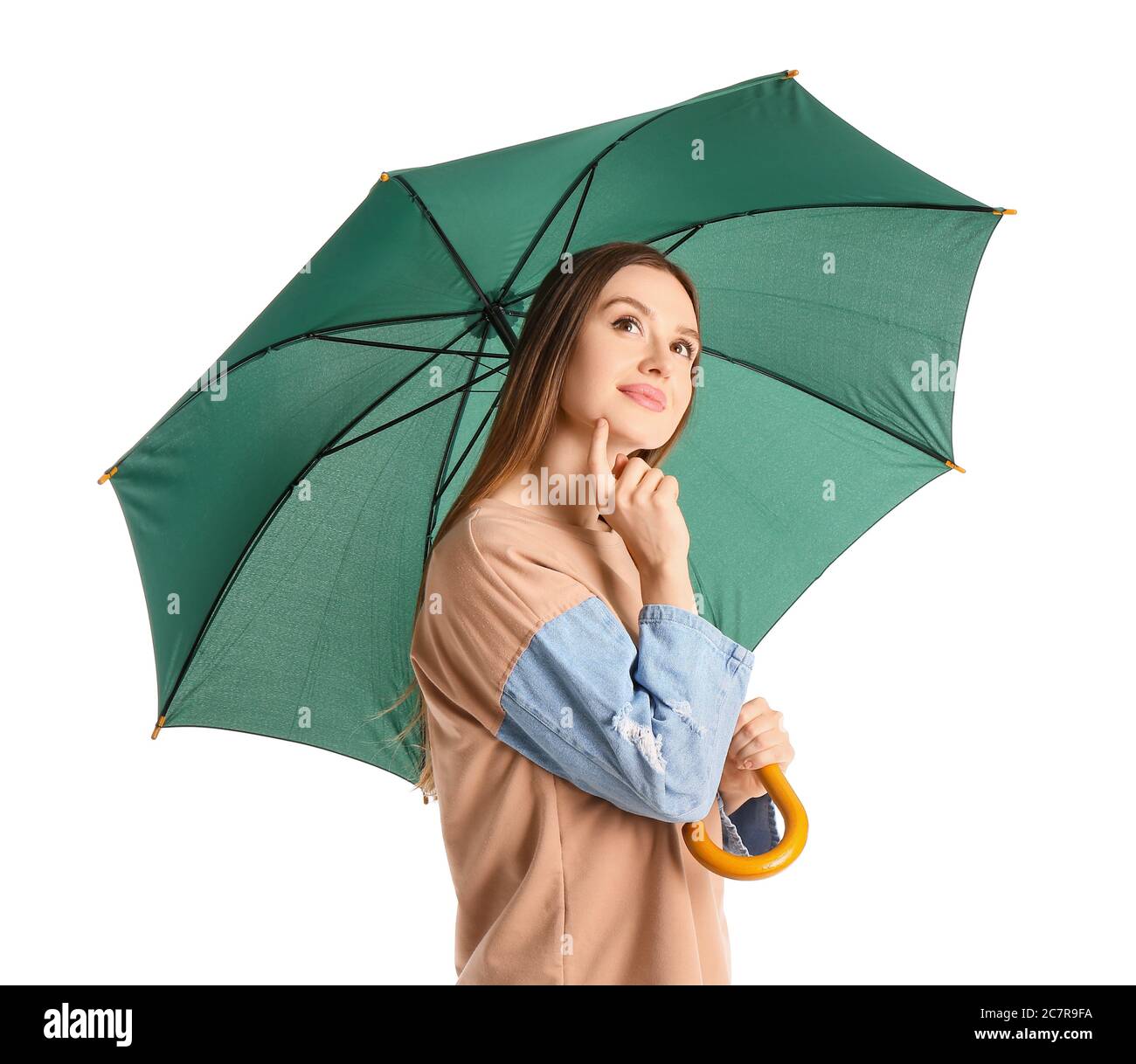 Beautiful woman with umbrella on white background Stock Photo - Alamy