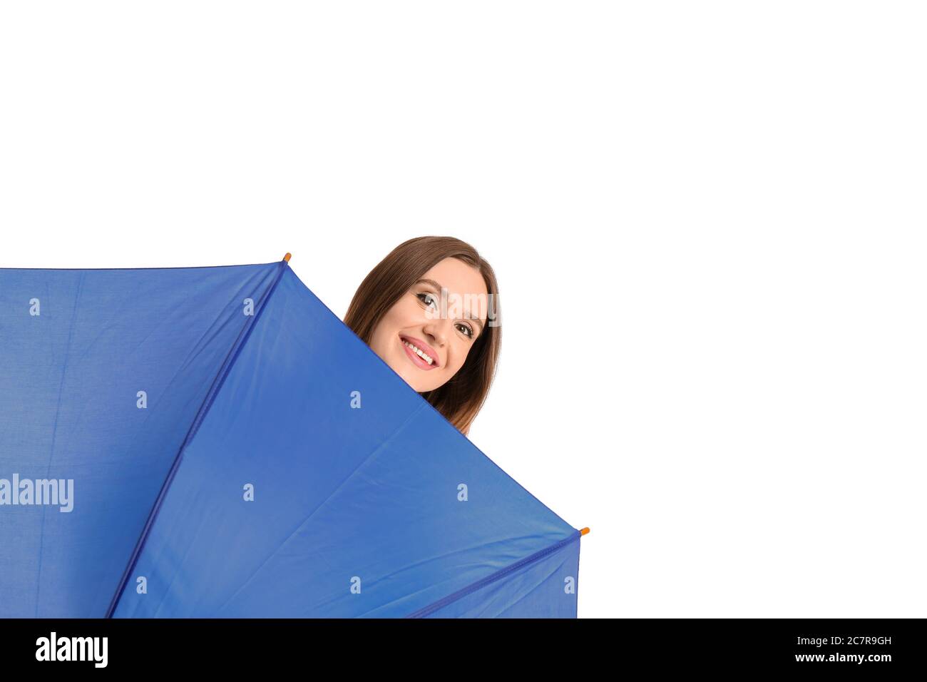 Beautiful woman with umbrella on white background Stock Photo - Alamy