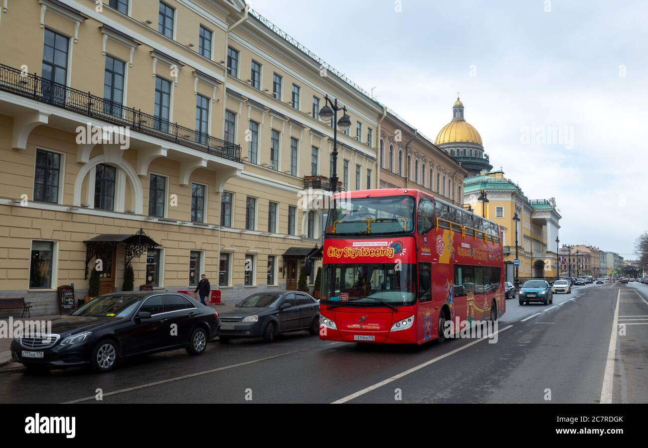 March 30, 2019 Saint Petersburg, Russia Red tour bus on a street in  Saint Petersburg. Stock Photo