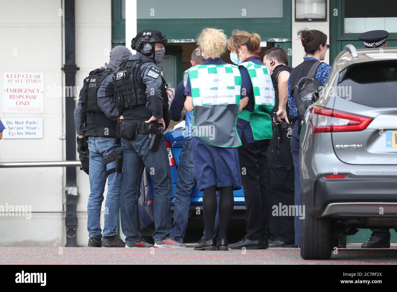 A Counter Terrorist Specialist Firearms Officer at the Royal Sussex County Hospital in Brighton, a man has been arrested on suspicion of attempted murder after a member of hospital staff was stabbed, according to police. Stock Photo