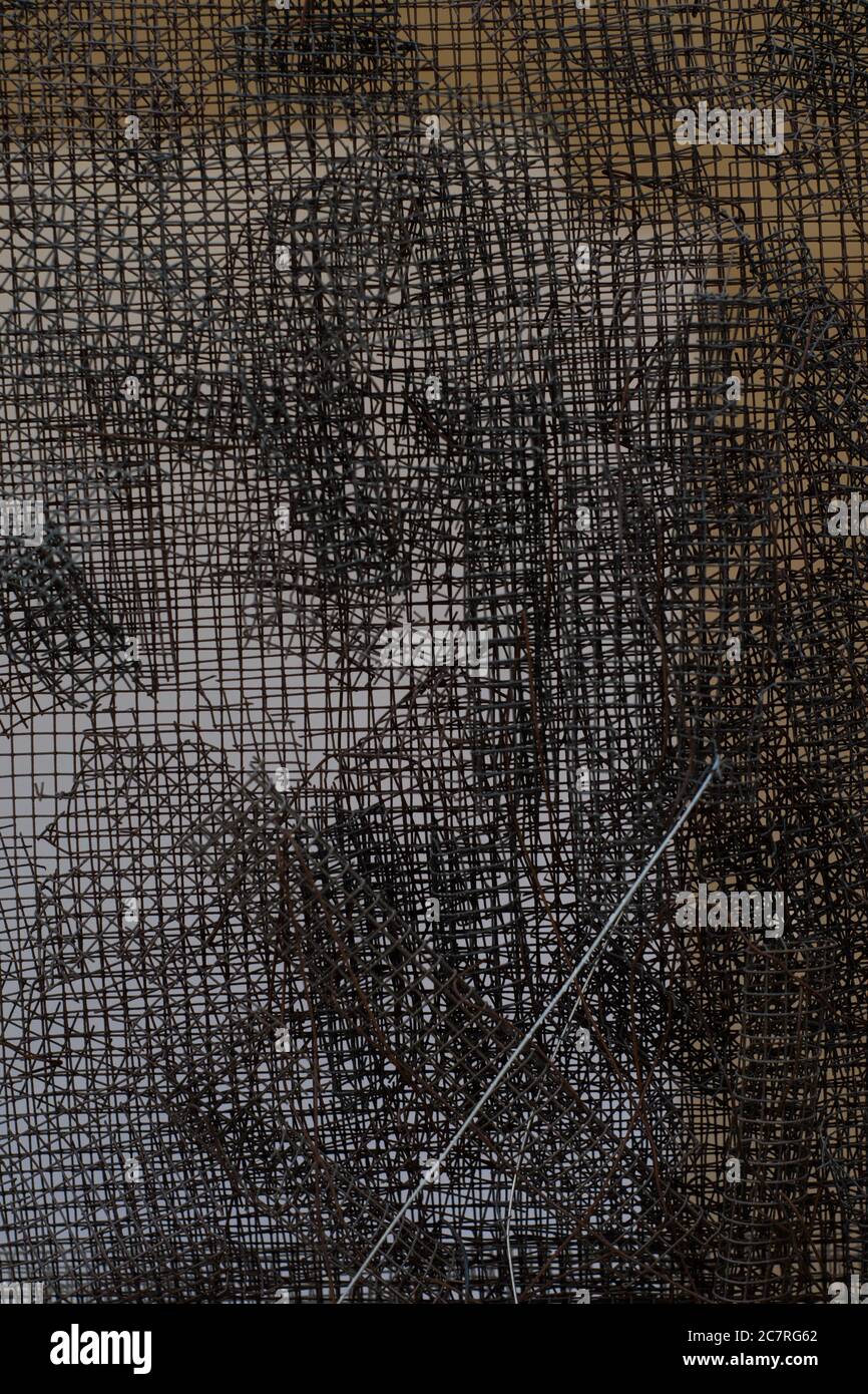 Closeup shot of many metal wire meshes laying on top of each other Stock Photo