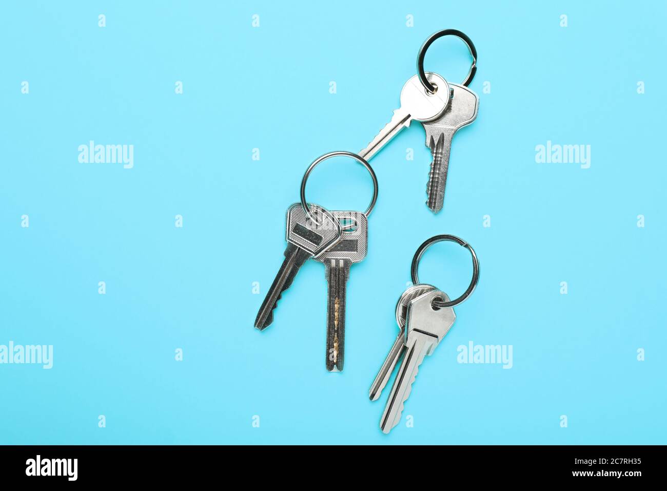 Many keys on color background Stock Photo