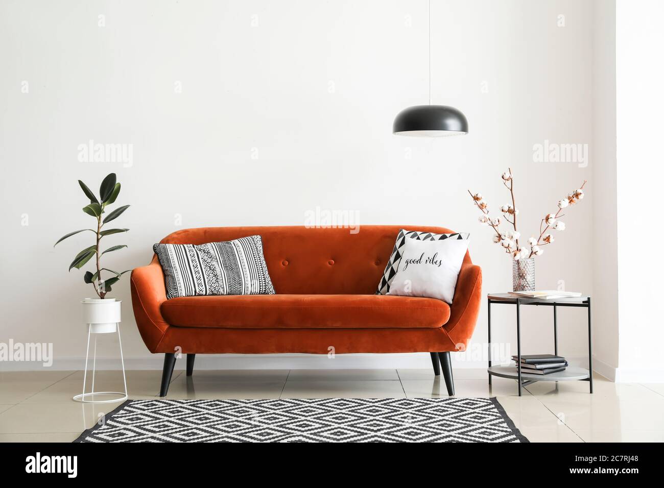 Interior of modern room with comfortable sofa Stock Photo - Alamy