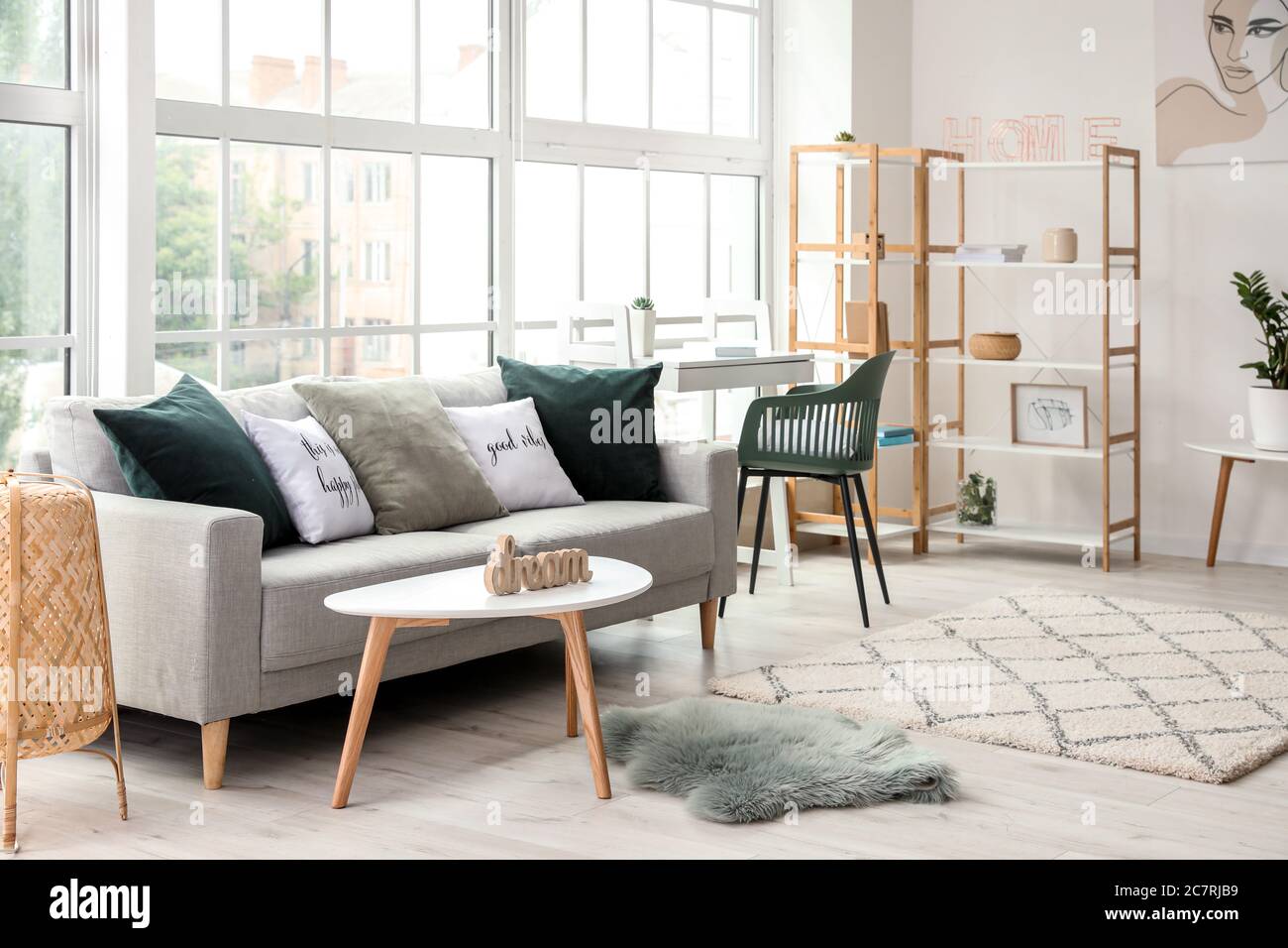 Interior of modern room with comfortable sofa Stock Photo - Alamy