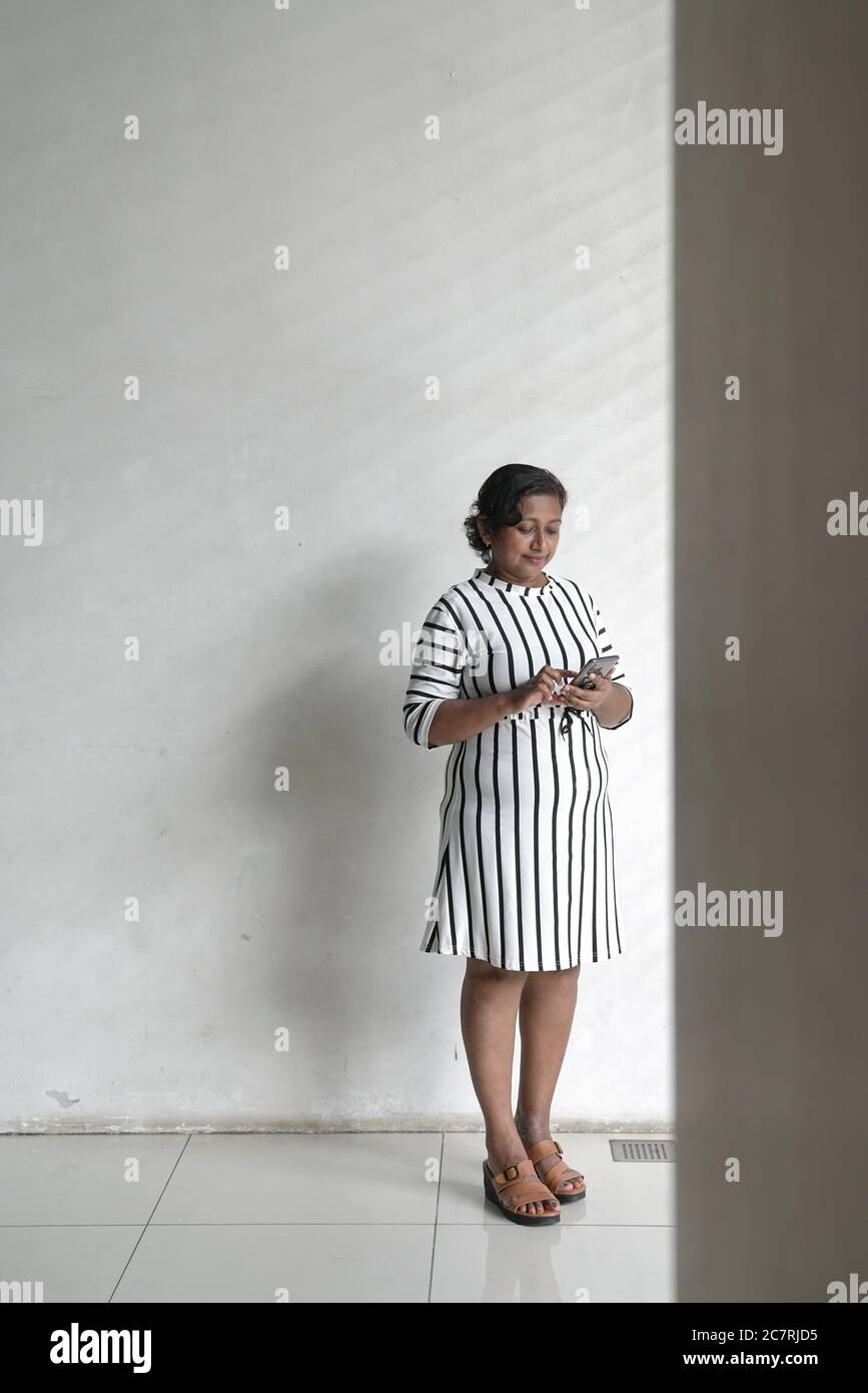 Full body asian woman standing hi-res stock photography and images - Alamy