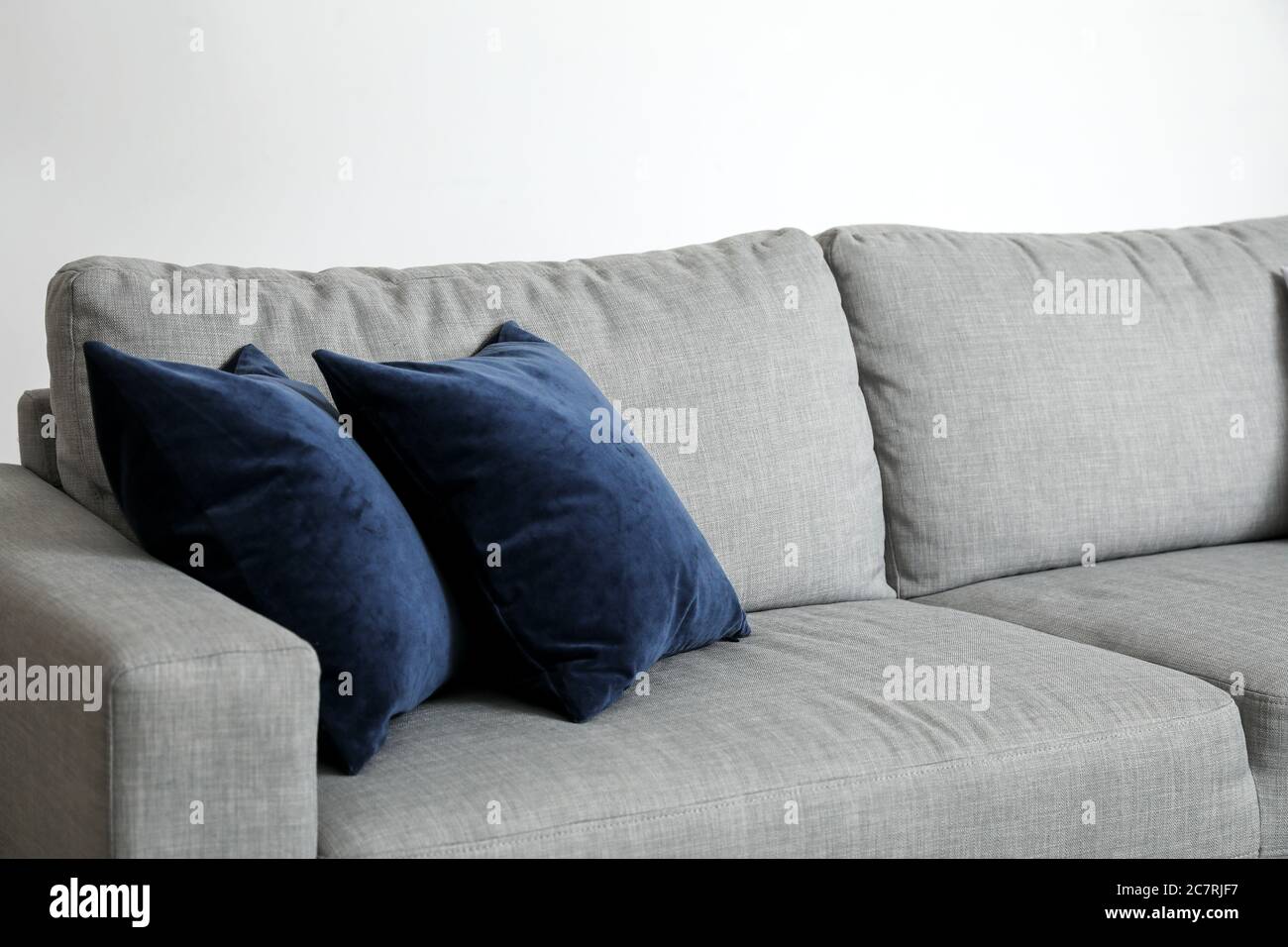 Stylish sofa in living room Stock Photo - Alamy