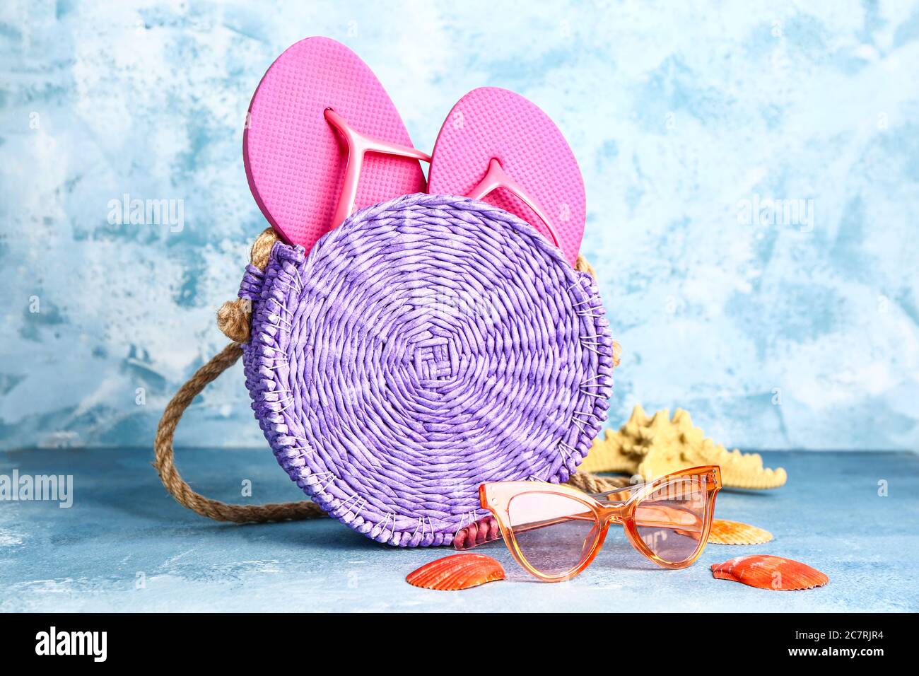Set of beach accessories on color background Stock Photo