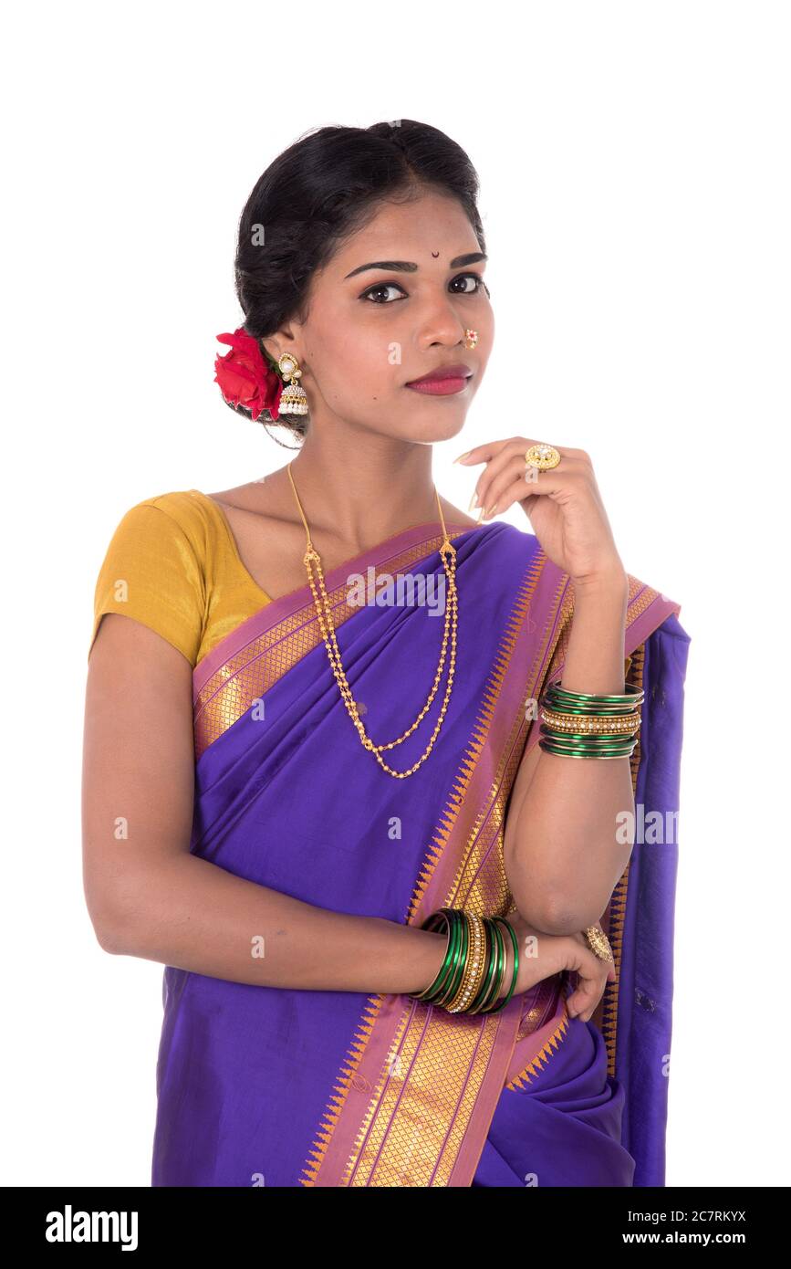 Beautiful Indian young girl posing in traditional Indian saree on white ...