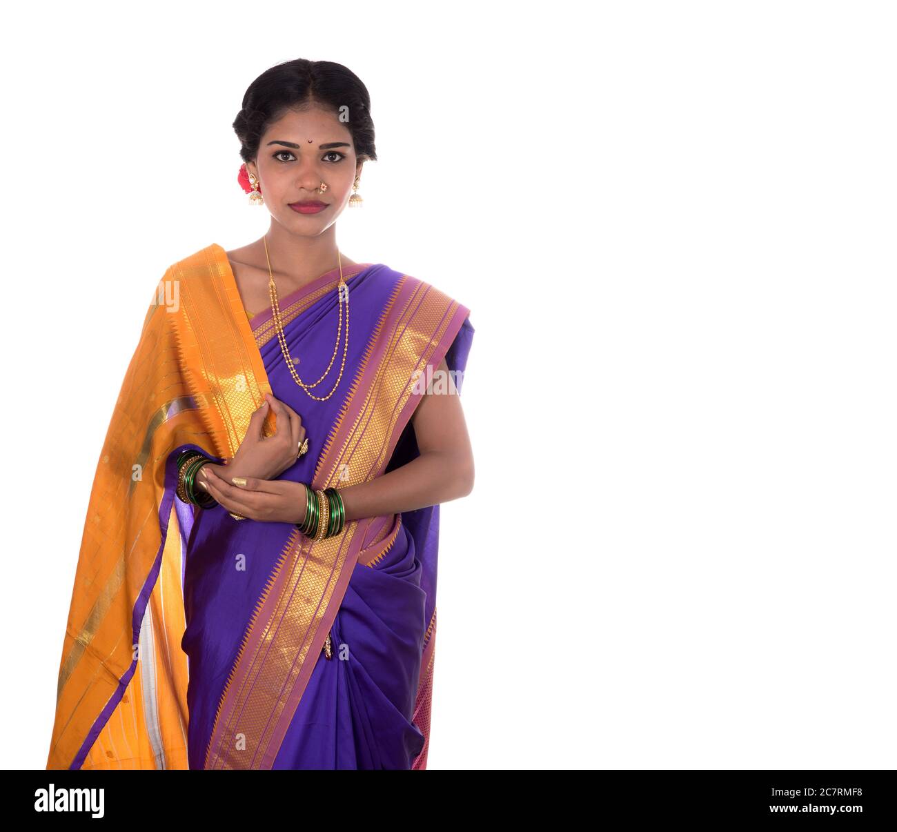Beautiful Indian young girl posing in traditional Indian saree on white ...