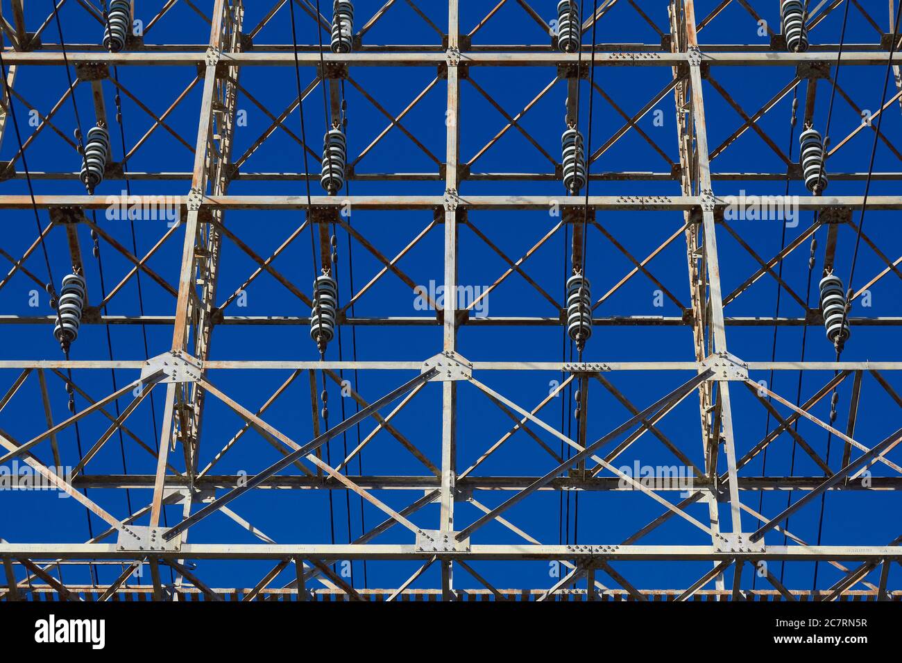Abstract Photo Of An Electricity Pylon Against A Vivid Clear Blue Sky ...