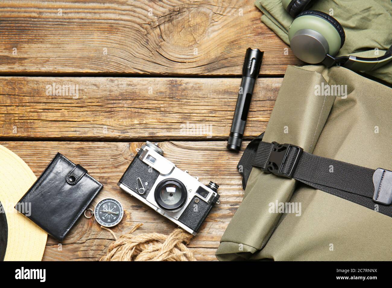Set of traveler's accessories on wooden background Stock Photo - Alamy