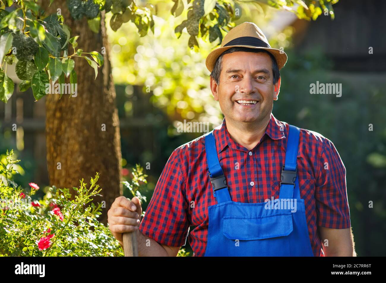 Man holding spade hi-res stock photography and images - Alamy