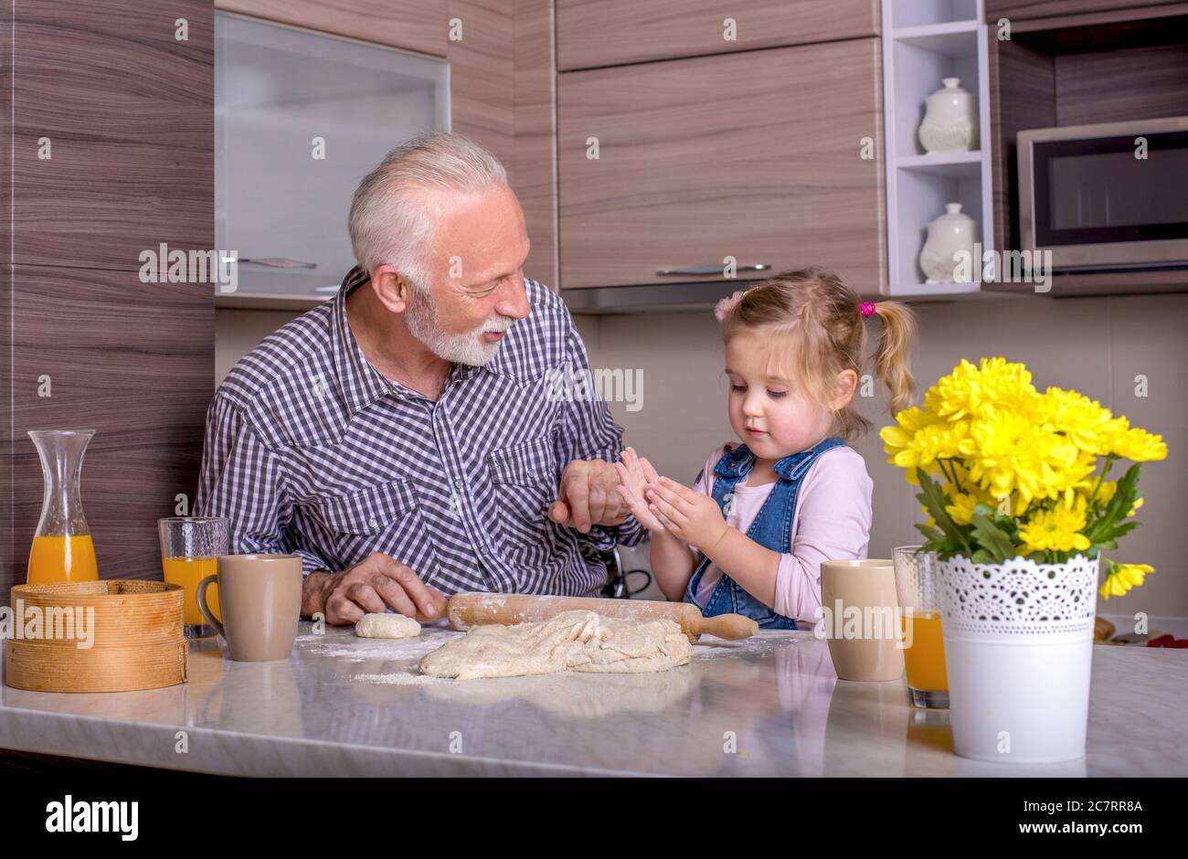 Male kid and grandfather cooking hi-res stock photography and images ...